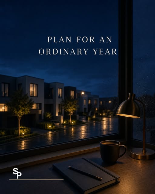 Original Solara creative reading Plan for an Ordinary Year, showing homes reflected in a rain-specked window, a desk lamp, a notebook and the Solara SP mark